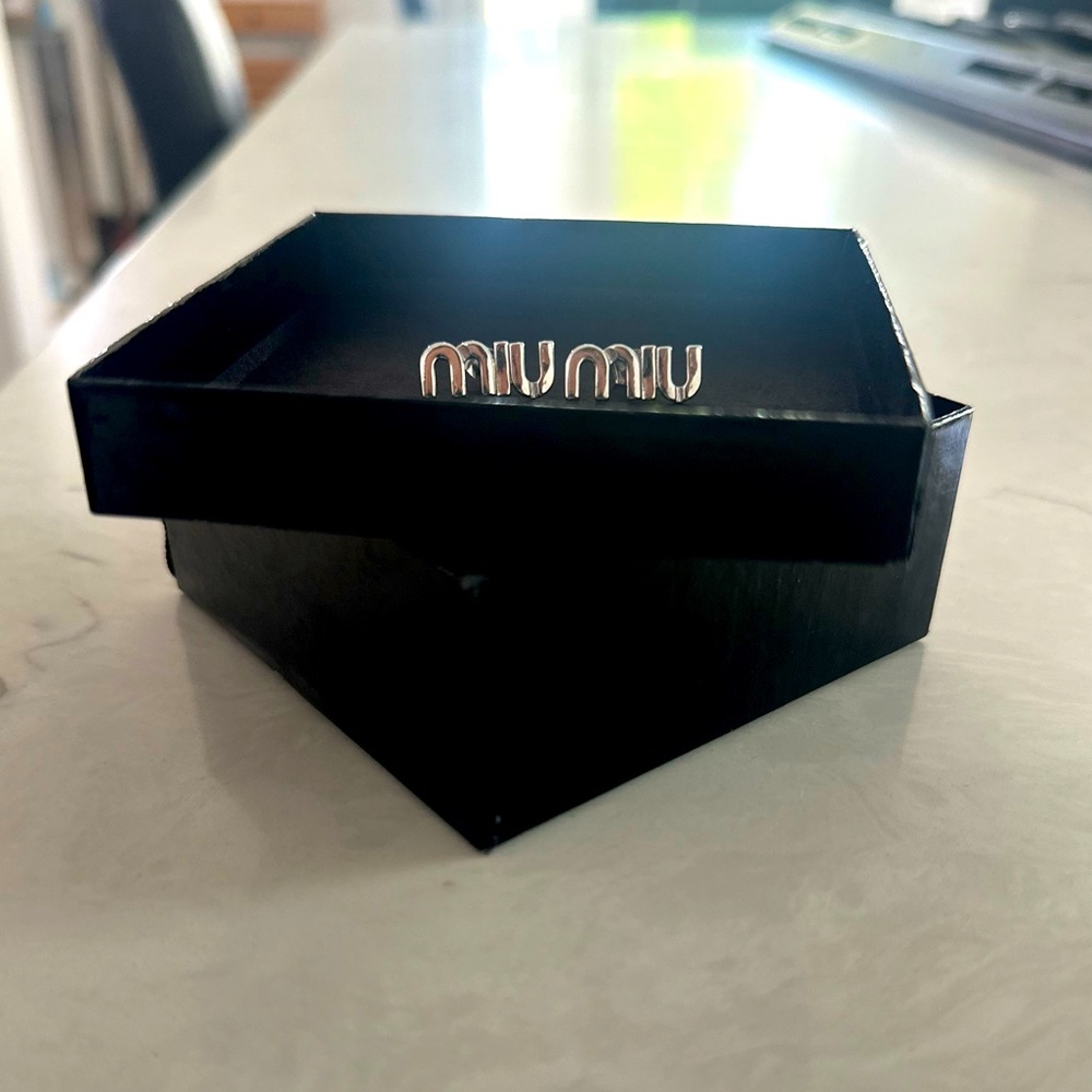Miu Miu earrings. Enameled metal